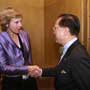 Connie Hedegaard, European Commissioner for Climate Action is greeted by Donald Tsang, Chief Executive for Hong Kong SAR at the Consumers International World Congress