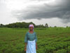 Farmer trainer shows her groundnuts