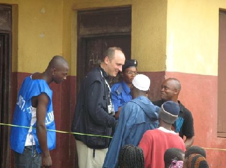 Man with ballot boxes