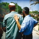 Neveh Dekalim colony - Retreat from the Gaza strip. August 2005 - Two Israeli men observing a demonstration against the retreat