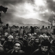 29 November 2005, Balakot, Pakistan. Men are sitting in line, waiting to collect 25,000 rupees as a compensation for their destroyed houses.