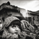 1 December 2005, Balakot, Pakistan. Young girls are collecting clothes to face the winter that has just started in Balakot.