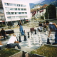 Chess players, Sarajevo, August 2003. Similar games of chess are played in various public places throughout Bosnia. People from all walks of life take part in these impromptu gatherings.