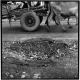 The road out of Nepalgunj to Bardiya is scarred by Maoist ambush sites. This particular blast claimed the lives of two women.