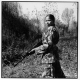 RNA recruit, Tharu Mina Kumari, age 20. "My husband, Tharu Patiram (age 23) was killed in an ambush while patrolling in the Chitwan area. I will marry again after the war if I can find a good man."