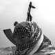 A former member of the militia, now member of the local police of Ramadi.