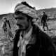 At the frontline between Jamiat and Jumbesh militias. Adan Khan, 28 years old (centre) is a Jamiat soldier, responsible for this outpost. A recent Jumbesh offensive has forced them to make a 4 kilometre retreat.
