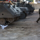 The Second Intifada. A dove lands near Israeli soldiers as the temporary lifting of a curfew comes to an end in the West Bank town of Ramallah. Reacting to a wave of deadly suicide attacks, Israel launched its biggest military offensive in over 20 years.