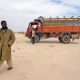 A young man walking in the Haafun village on the Somali coast. Hit by the tsunami, the Haafun community struggles to survive along the coast line, fishing sharks and lobsters to be sold to the rest of the world in an "uncontrolled way".