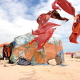 A young Somali woman comes out of her provisionally built shelter. Her house, on the Somali coast in the Haafun area, was destroyed by the tsunami.