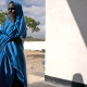 A Somali woman standing in front of the hospital entrance in Eyl, Somalia.