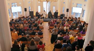 An overhead crowd shot of a meeting at Bozar Arts Centre