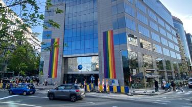 EEAS HQ Building with two large Rainbow sticker on the facade