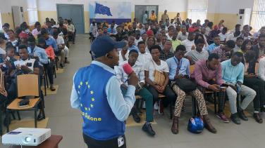 Press and Information Officer of EU Delegation, N'fa Alie Koroma presenting the programme to Fourah Bay College students