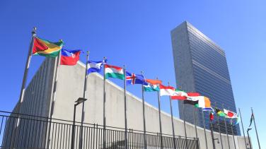 UN building with flags in front