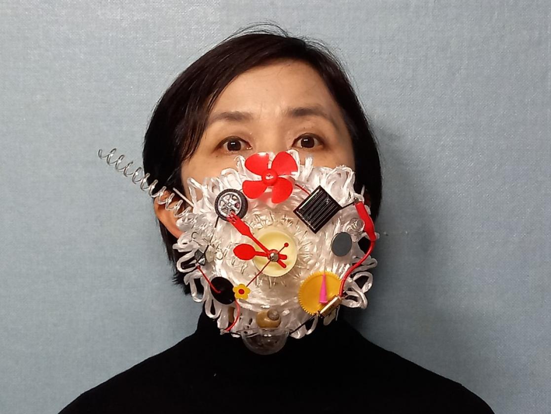 Woman with an object on her face