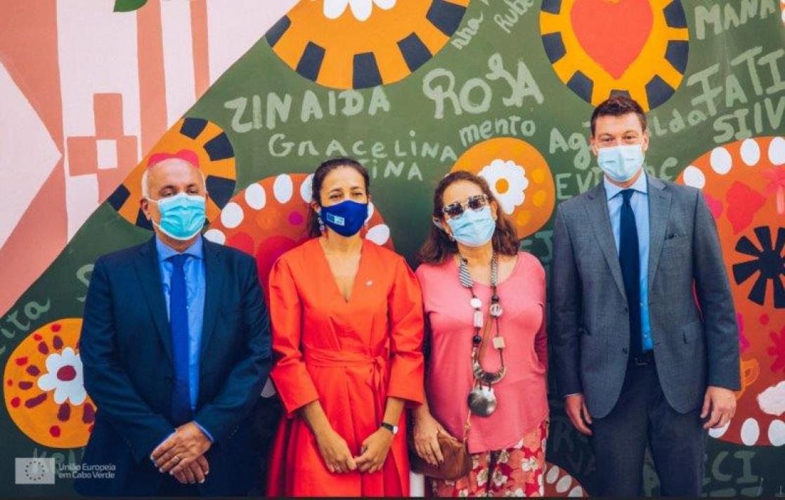 Group of people posing with face masks
