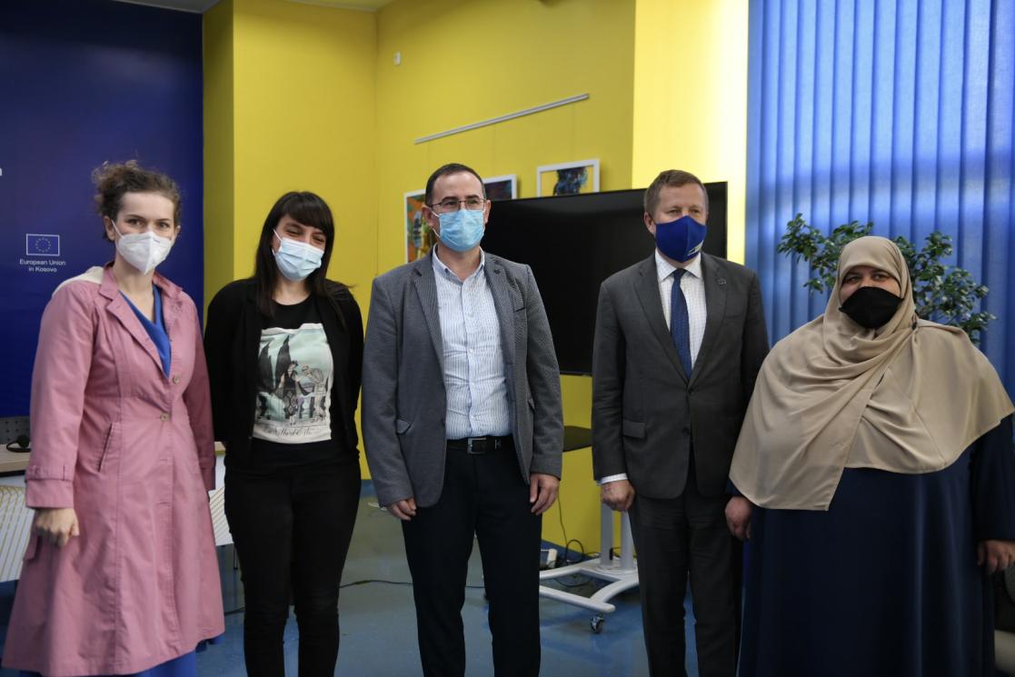 Group of people wearing face masks posing