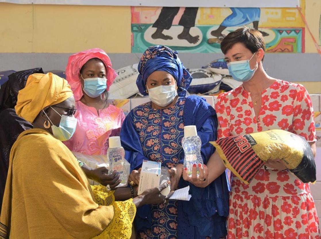 Women with humanitarian aid packages