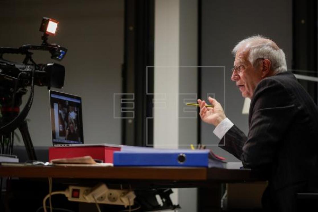 Man talking in front of a camera