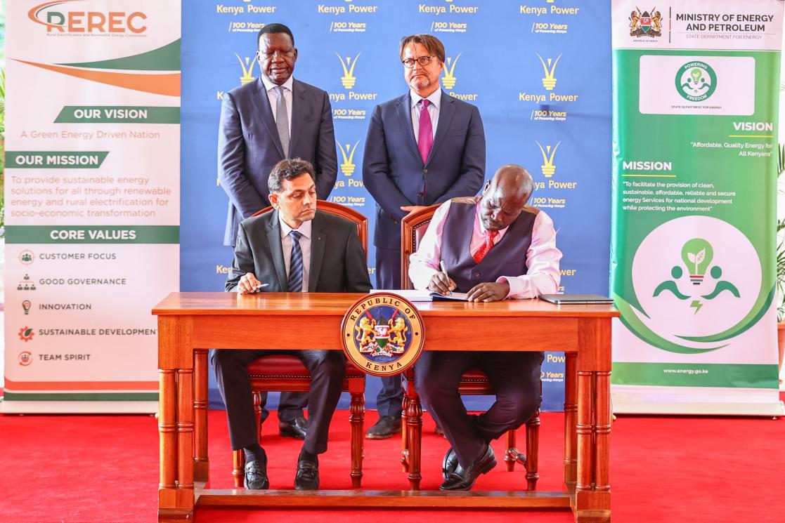 EIB representative looks on during the signing of the contracts