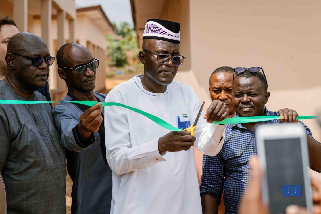 Deputy Minister of Local Government cutting the tape to officially open the public infrastructures