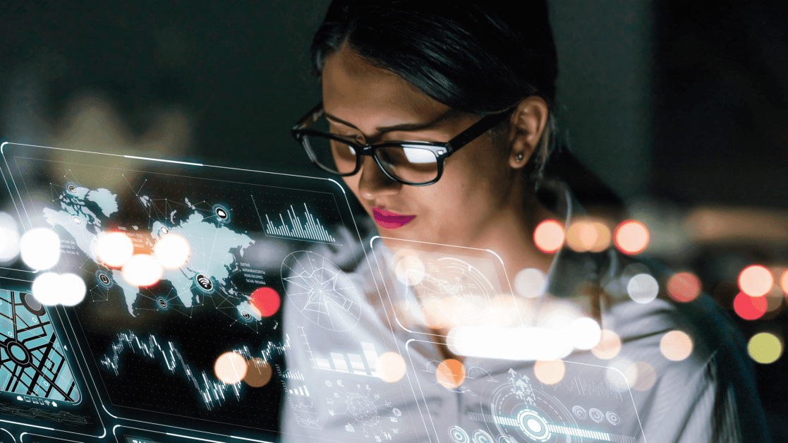 Woman wearing glasses surrounded by screens in cyber concept image.