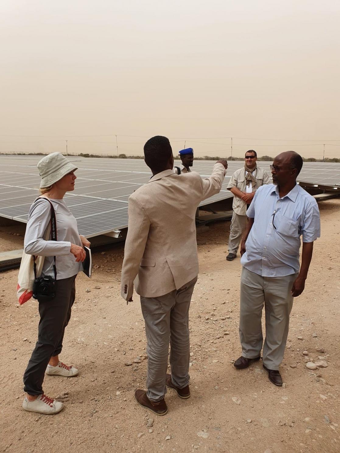 EUCAP Somalia’s Environmental Advisor Environmental advisor Maria Cosnier with solar panels.