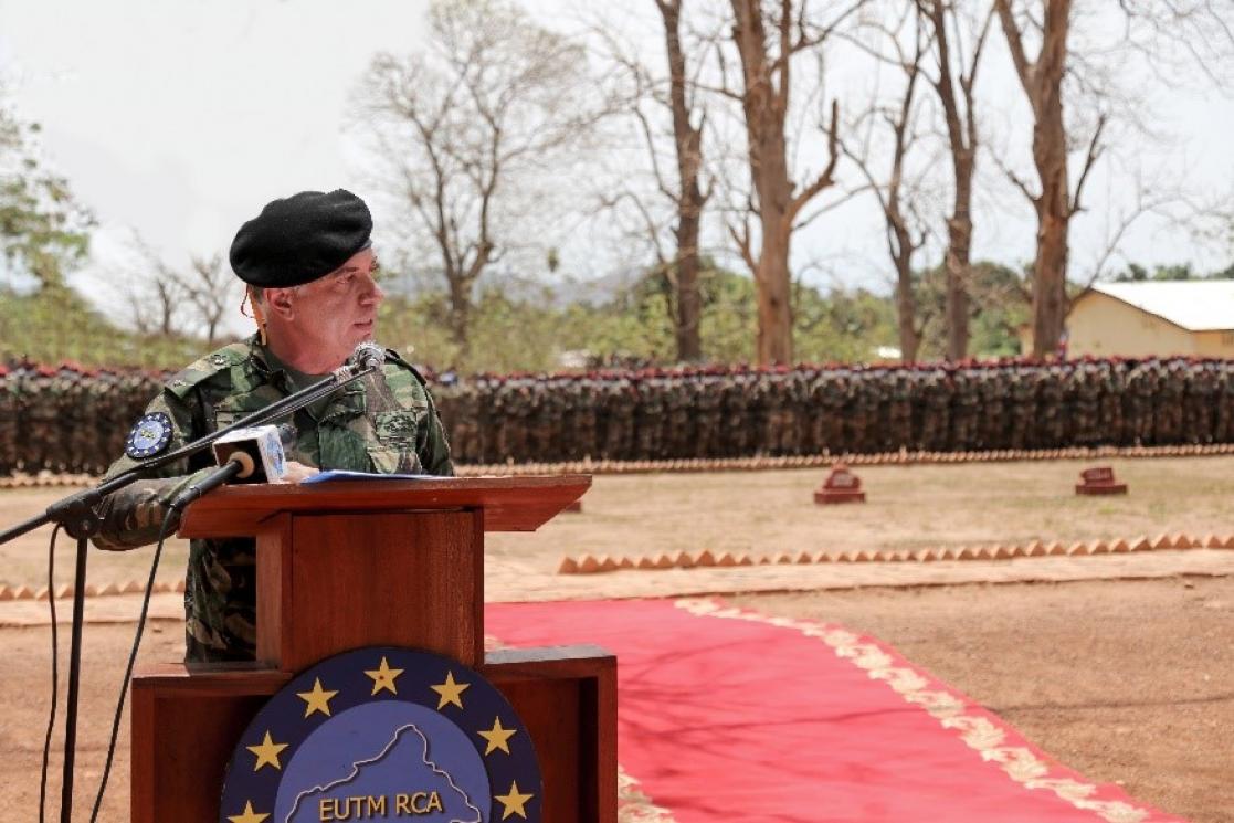Militar talking into a lectern