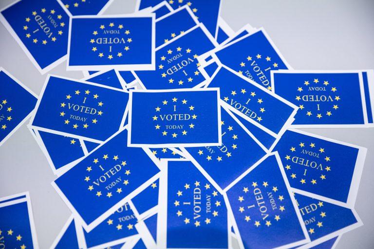 flyers with EU flag on them and. Message  "I Voted" is written on them 