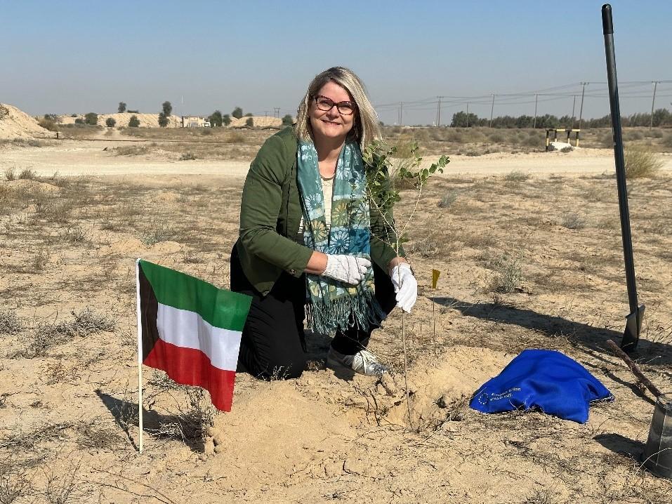 EU Ambassador Anne Koistinen planting a tree on behalf of the EU Delegation at Al-Abdaliya reserve.