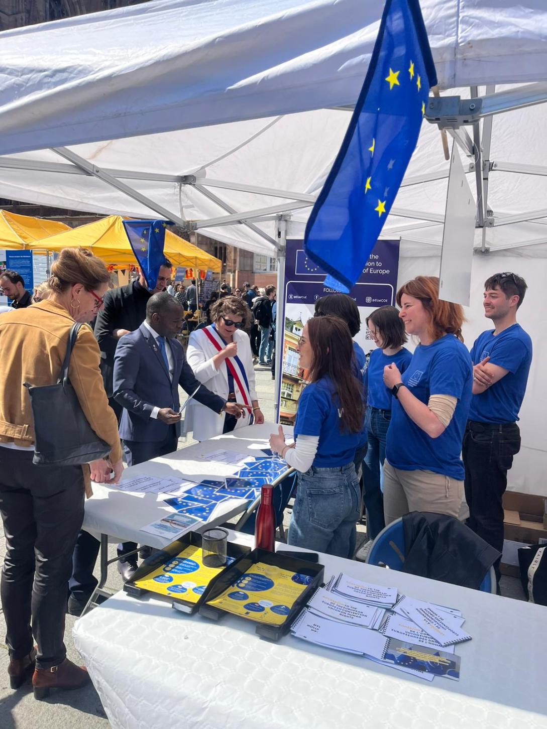 People visiting the stand