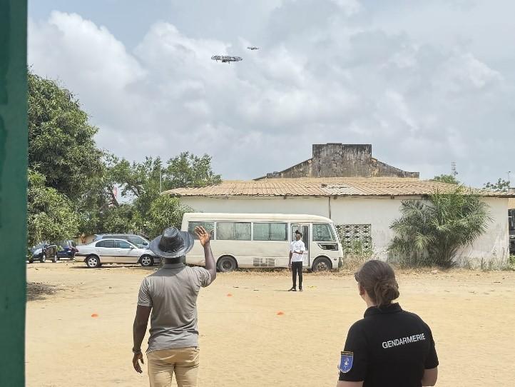 People training with a drone.