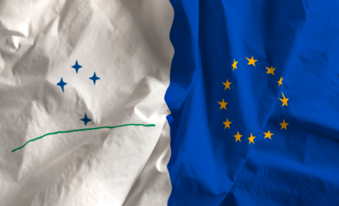 The EU flag flies alongside that of Mercosur.