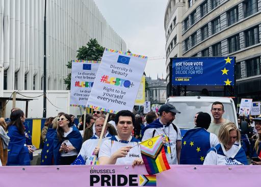 People with banners at Pride parade