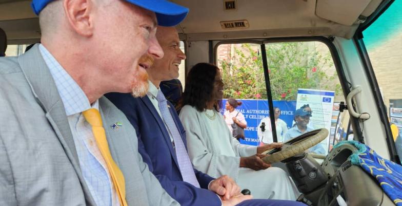 MInister of Planning & Economic Development takes the driver's seat at the Launching of the Bus Tour