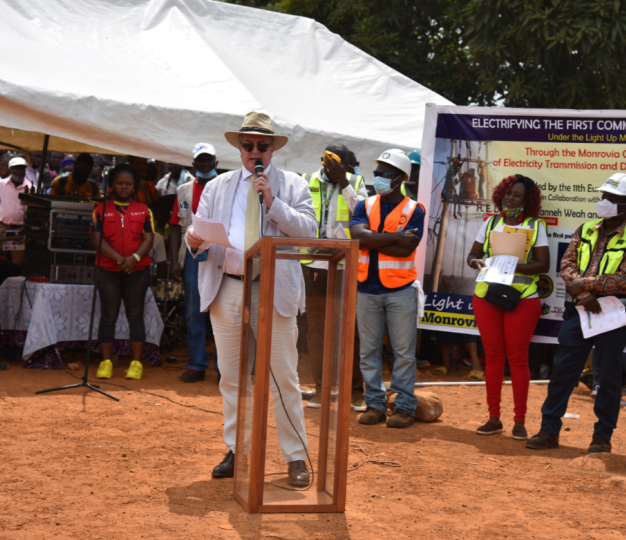 Ambassador Laurent Delahousse speaking at the electrification of 1,800 households in Peace Island Community in Congo Town, Monrovia. 
